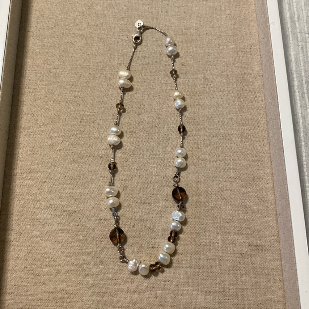 A Silpada gem! .925 Sterling silver with real pearls.